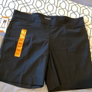 Woman’s black Bermuda shorts